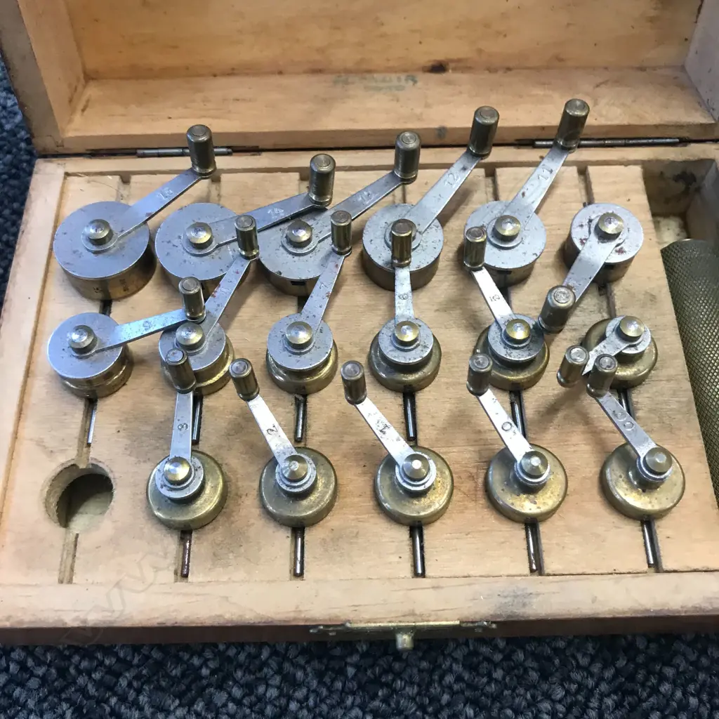 BOXED SCREW HEAD POLISHING TOOLS (2) AND BOXED SWISS 'FAVORITE' MAINSPRING WINDER SET Image 1++